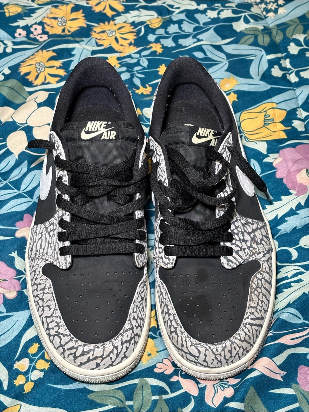 Jordan 1 Low Sneakers in Black and White with Elephant Print
